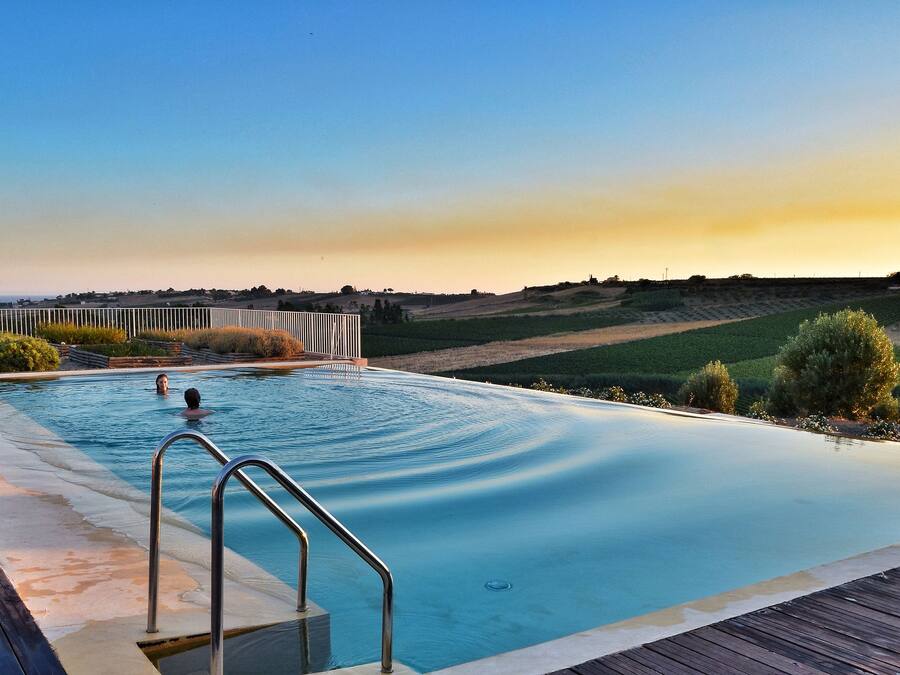 Outdoor pool, pool umbrellas, sun loungers
