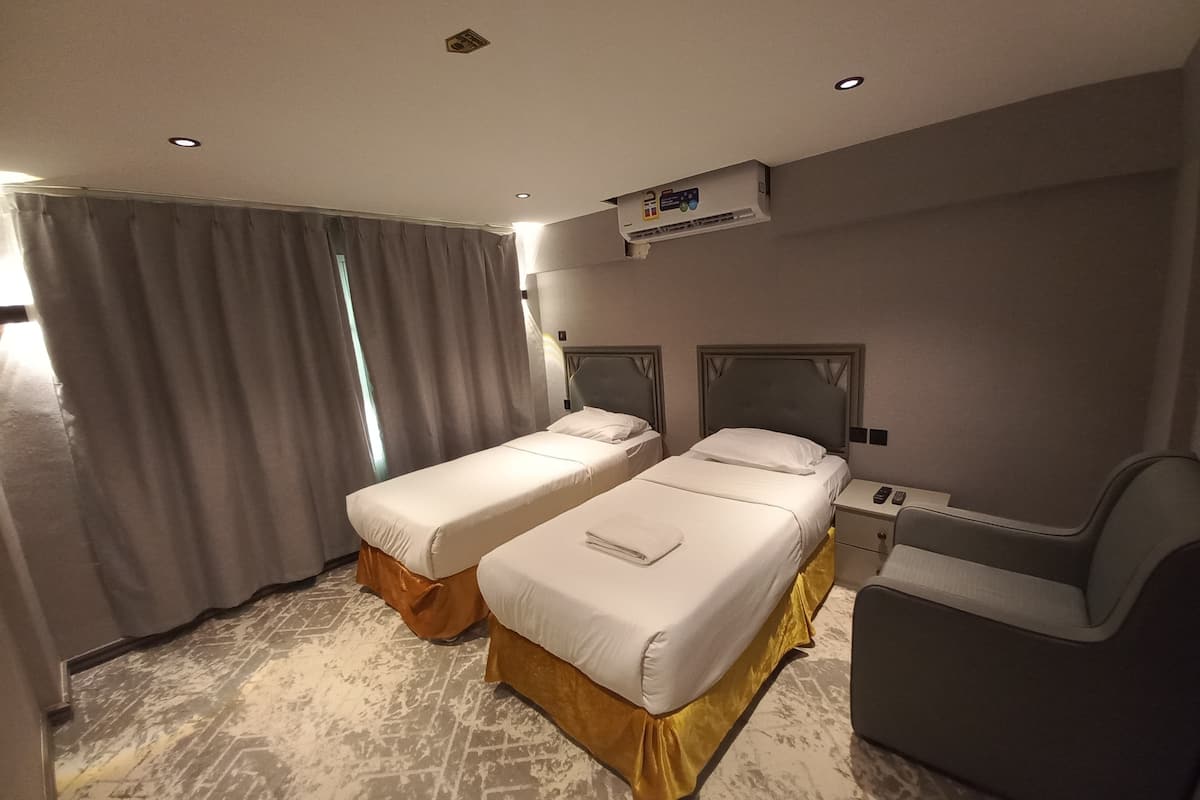 Eenvoudige Twin kamer | Gratis wifi, beddengoed