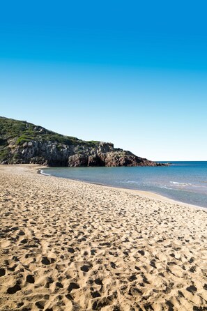 Guarda-sóis, toalhas de praia 