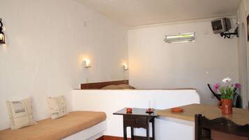 Estúdio | Área de estar | TV