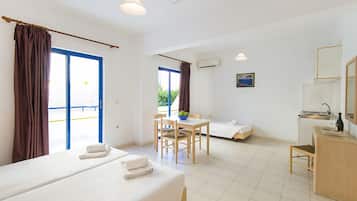 Apartamento Confort | Colchones con acolchado adicional y cortinas opacas