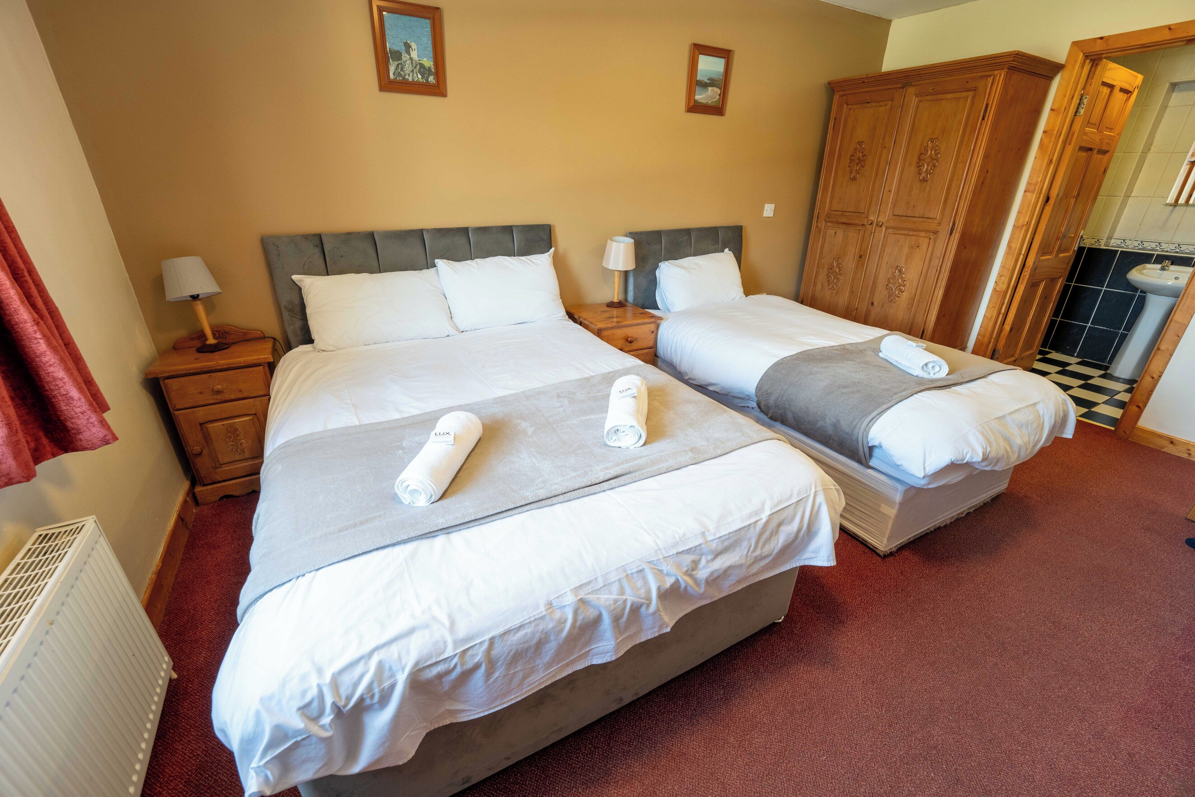Premium bedding, pillow-top beds, desk, iron/ironing board