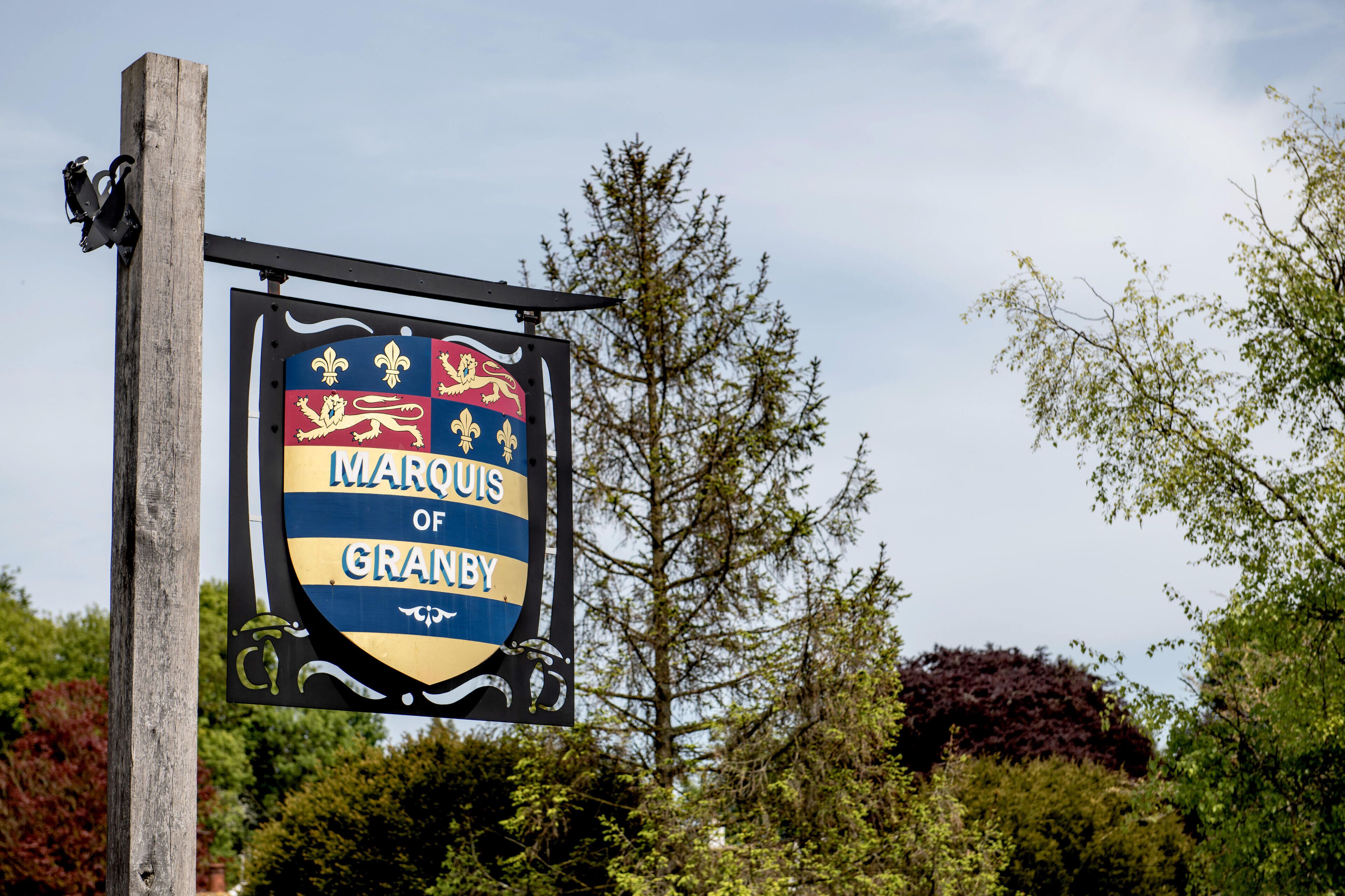 A sign with the text "Marquis of Granby" and a coat of arms.
