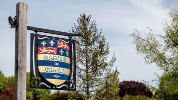 A sign with the text "Marquis of Granby" and a coat of arms.