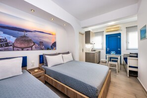 Standard Studio for 3 people | Egyptian cotton sheets, premium bedding, memory-foam beds, in-room safe - Honeymoon Beach Studios (Santorini)