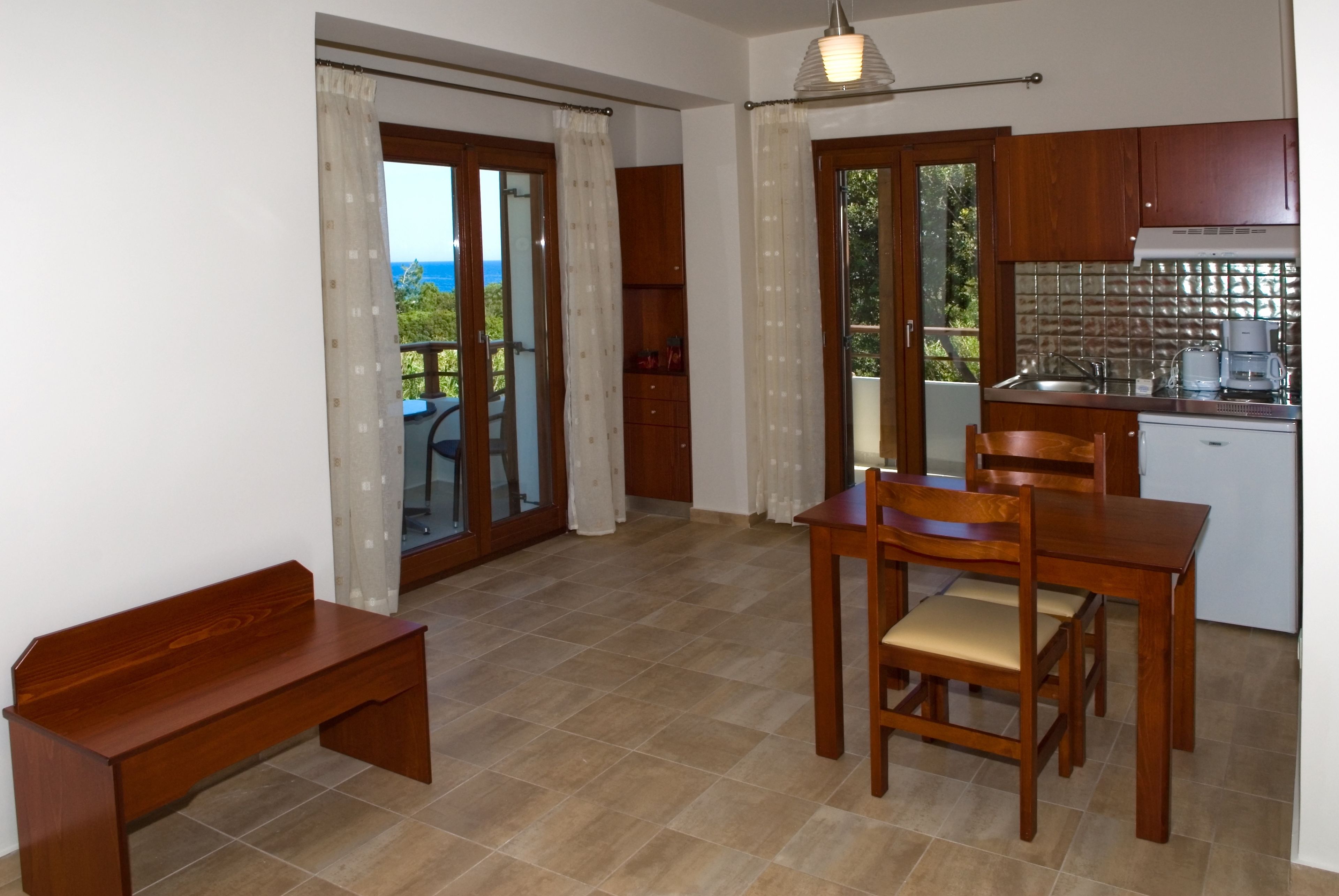 fridge, stovetop, coffee/tea maker, electric kettle