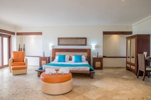 Suite, 1 cama King size | Ropa de cama de alta calidad y minibar 