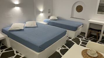 Deluxe Triple Room | Egyptian cotton sheets, premium bedding, memory-foam beds, desk