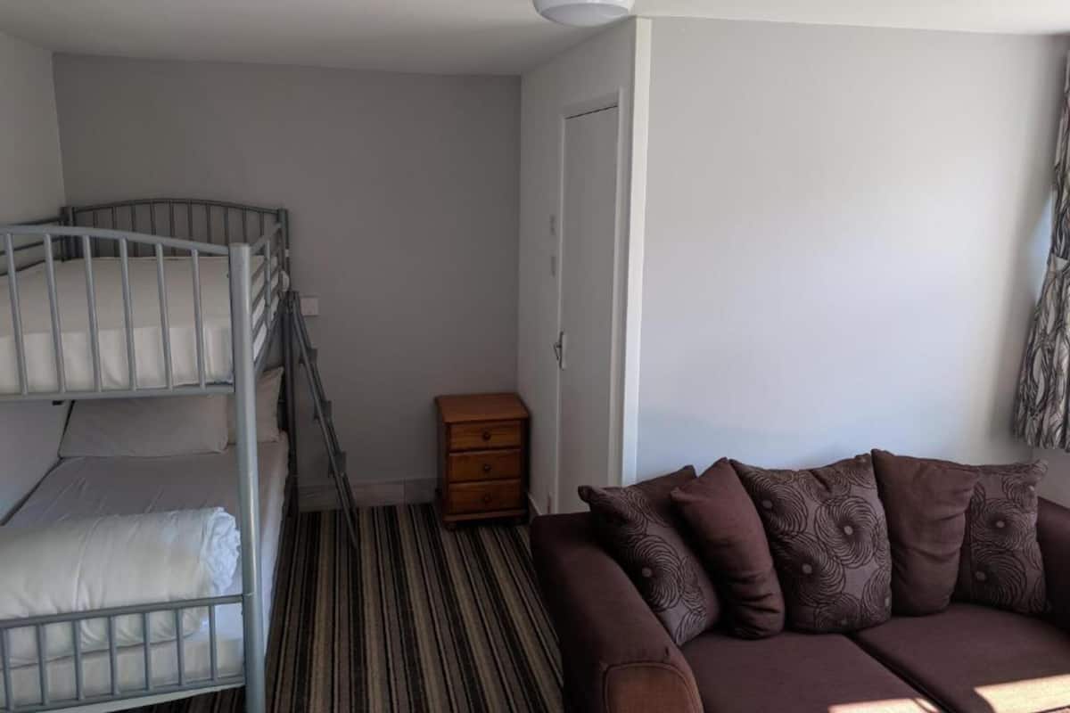 1 bedroom, desk, bed sheets