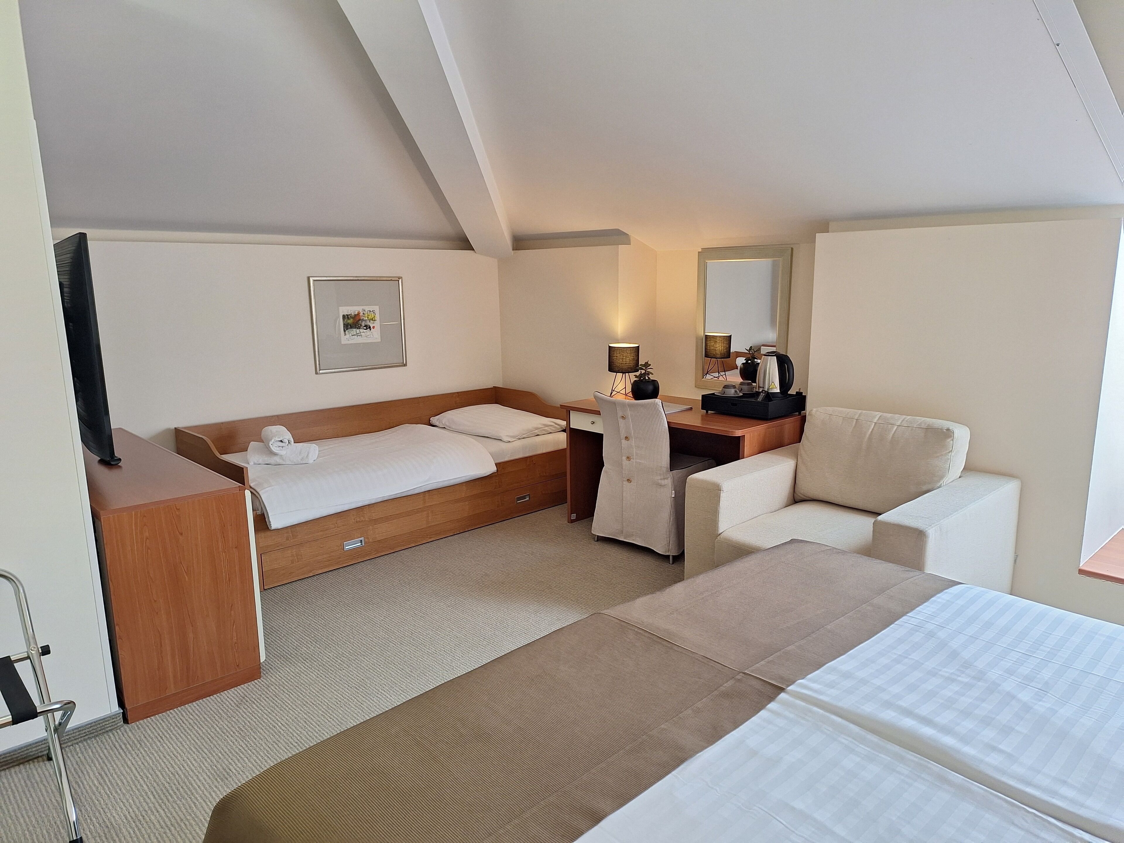 family double room | 1 bedroom, premium bedding, minibar, in-room safe