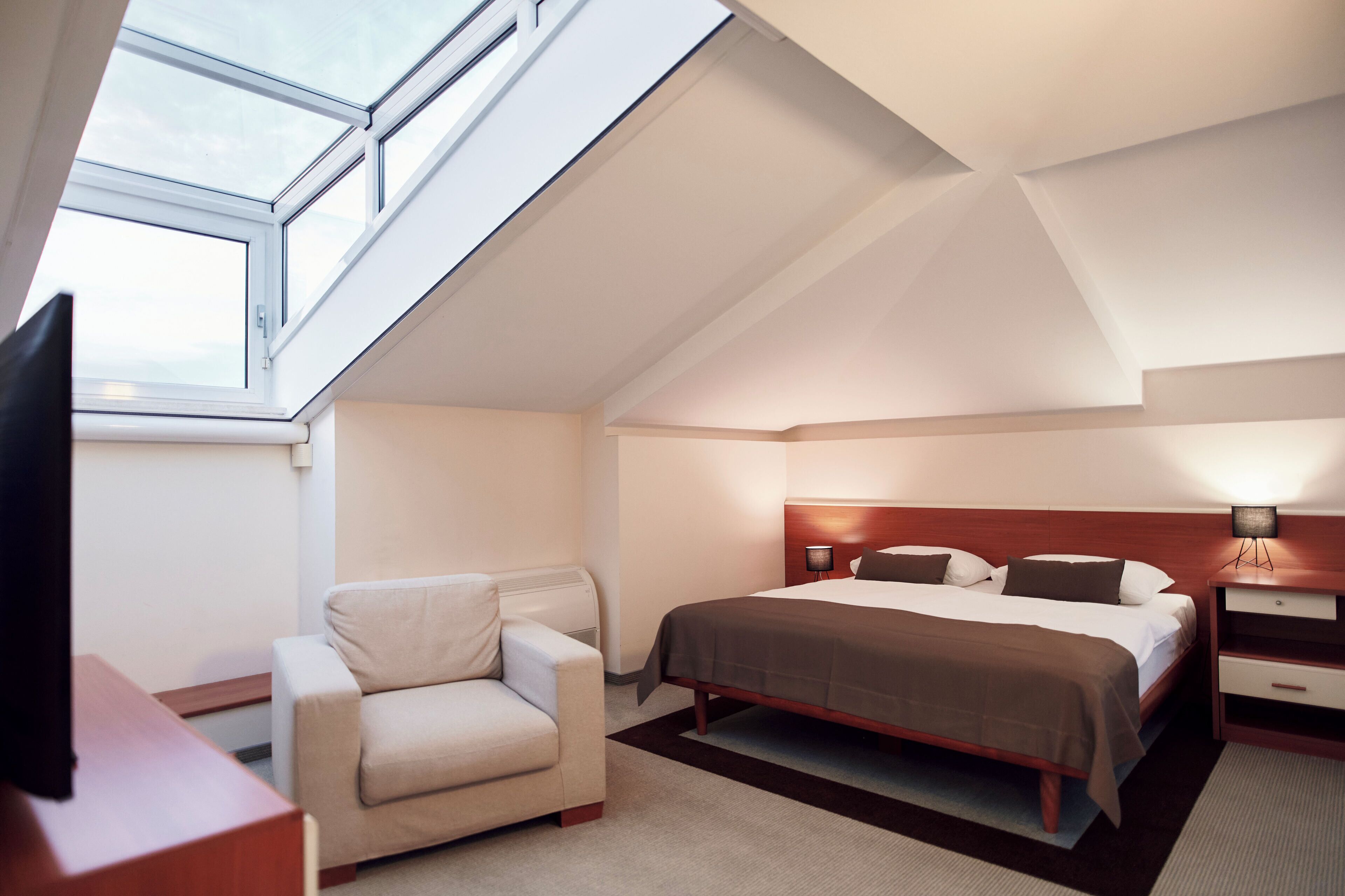 standard double room, partial sea view | 1 bedroom, premium bedding, minibar, in-room safe