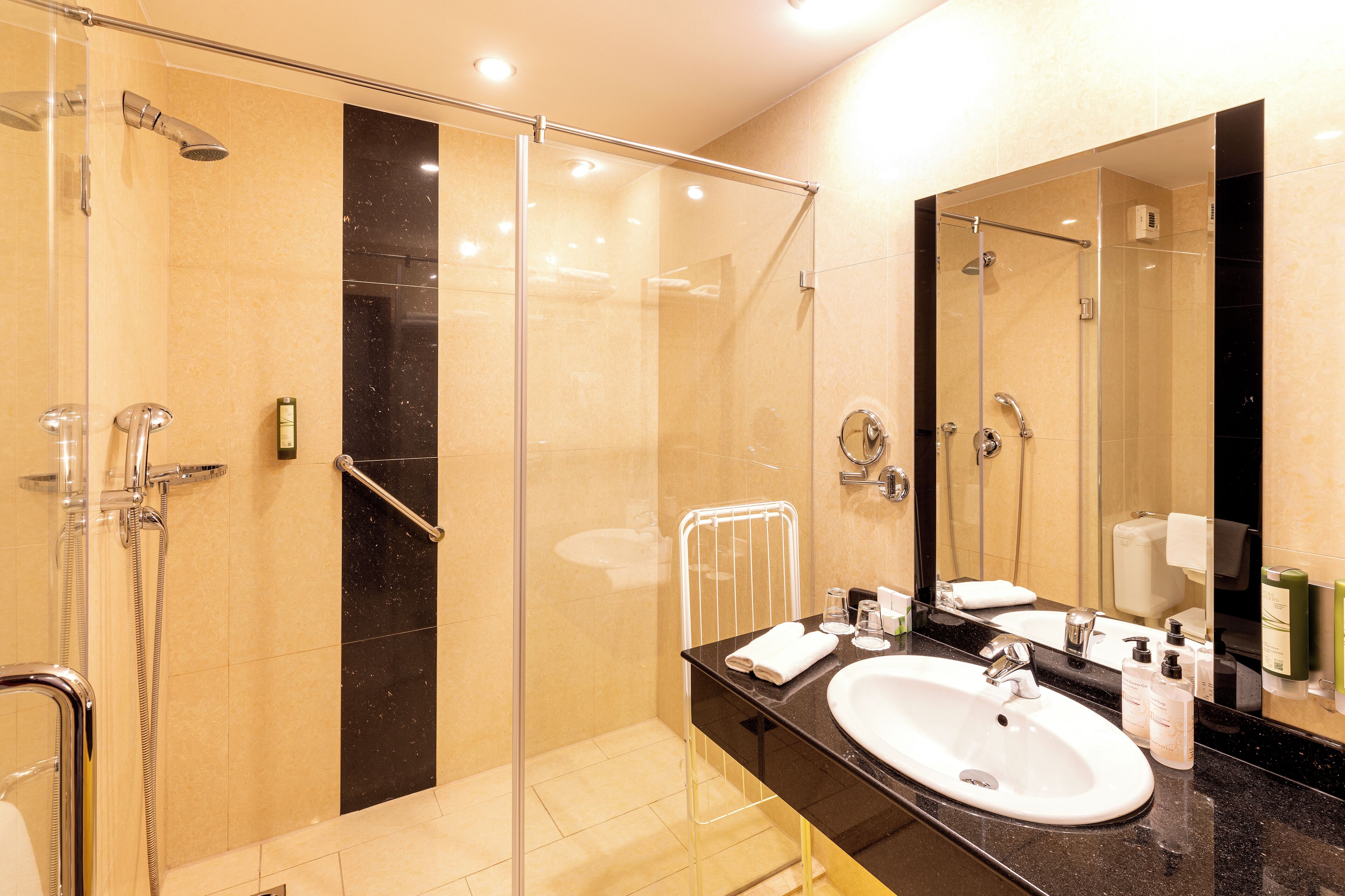 deluxe double room | bathroom | eco-friendly toiletries, hair dryer, bathrobes, slippers