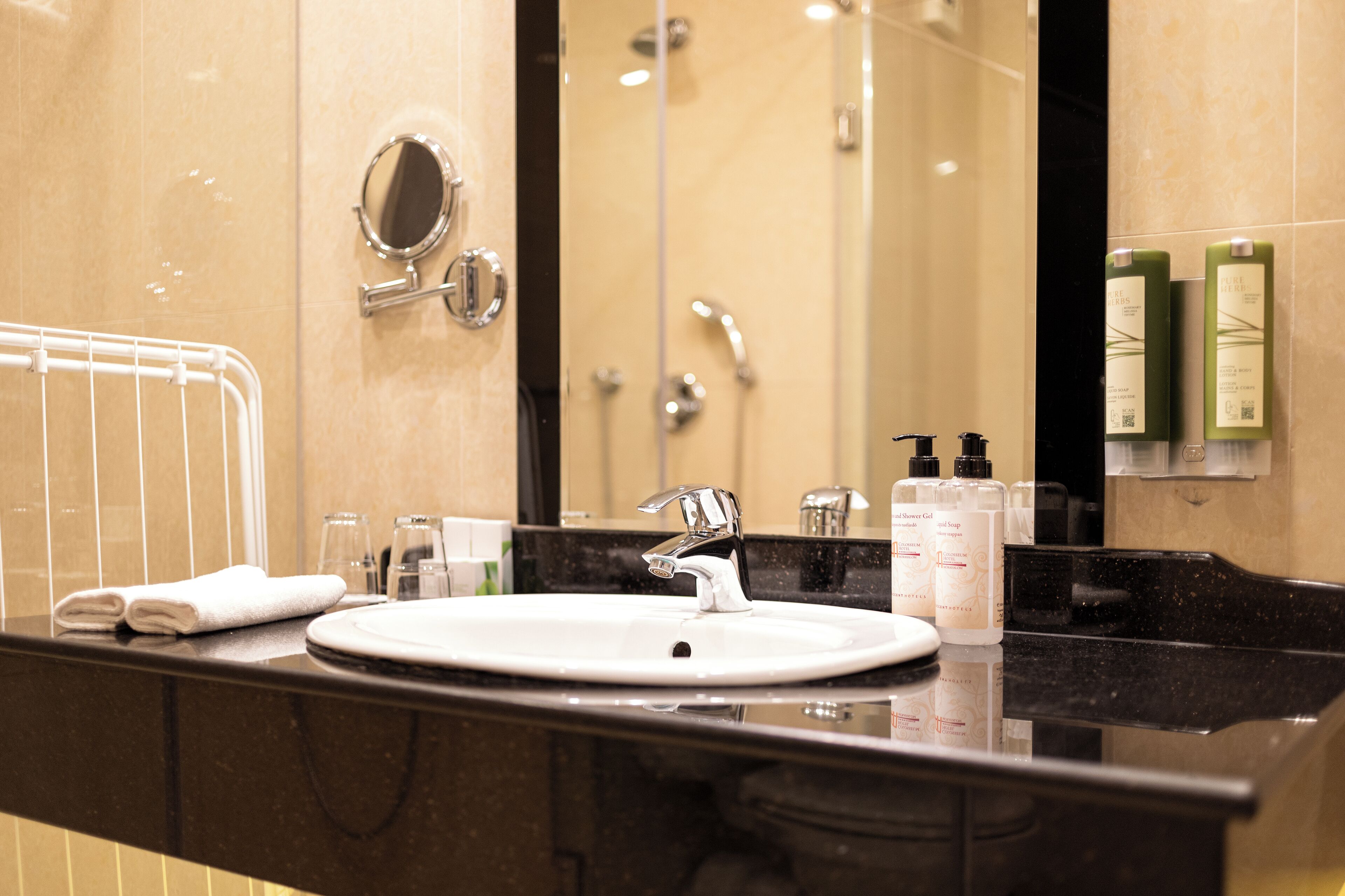 deluxe double room | bathroom | eco-friendly toiletries, hair dryer, bathrobes, slippers