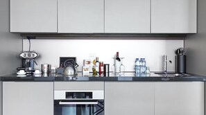 Presidential Suite, 2 Bedrooms, 2 Bathrooms | Private kitchen | Fridge, microwave, oven, stovetop