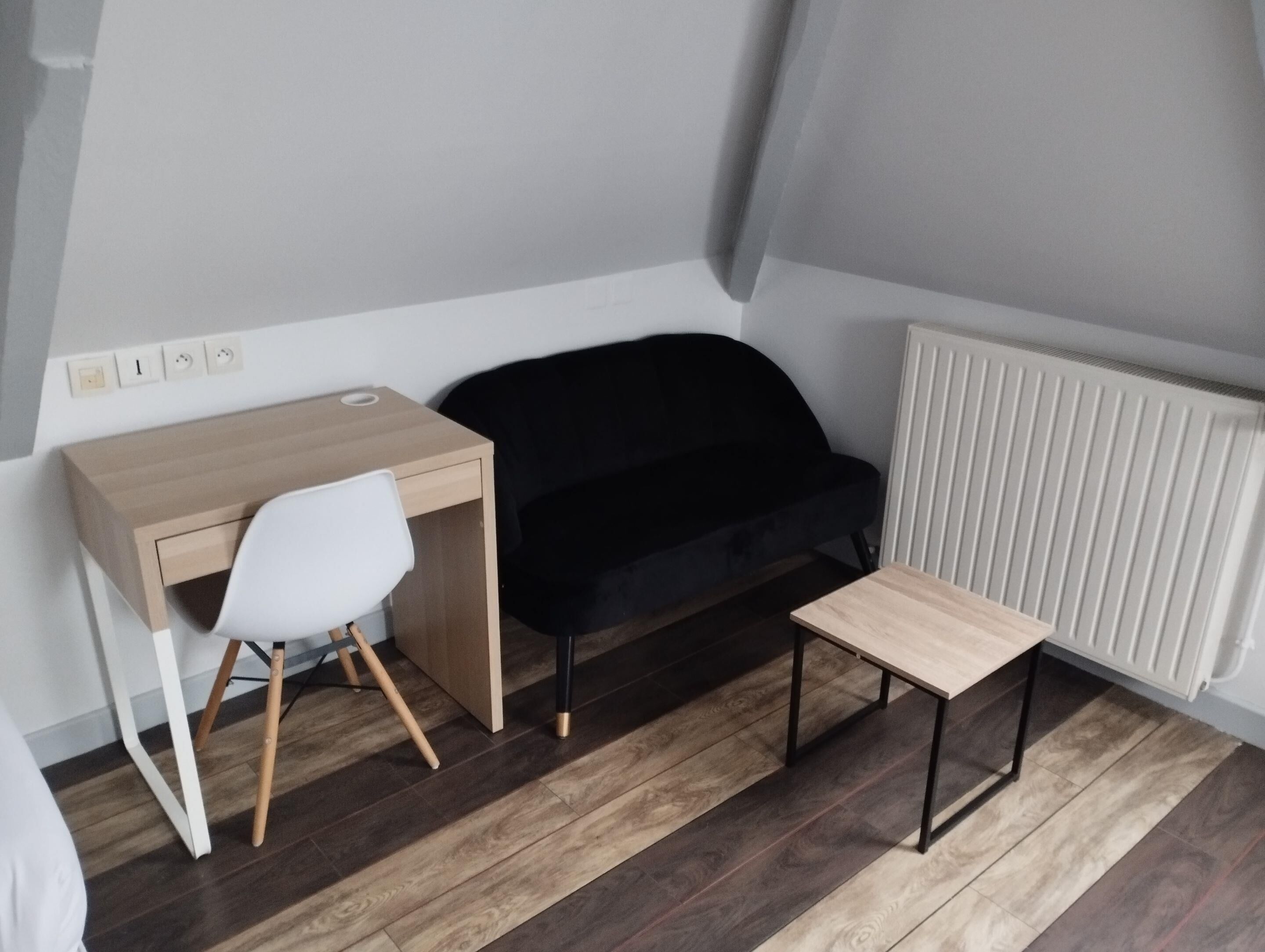 Desk, iron/ironing board, bed sheets