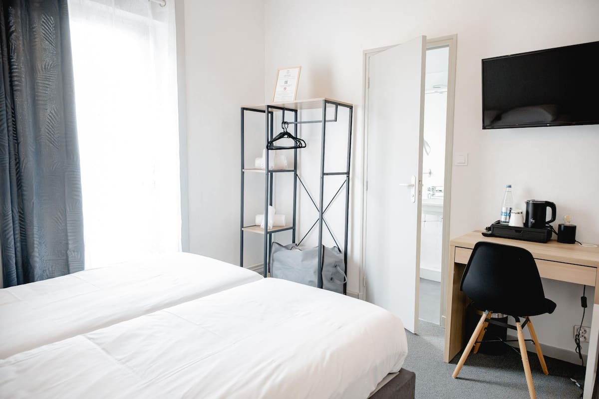 Classic Twin Room, 2 Twin Beds | Premium bedding, Select Comfort beds, desk, iron/ironing board