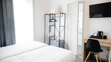 Premium bedding, Select Comfort beds, desk, iron/ironing board