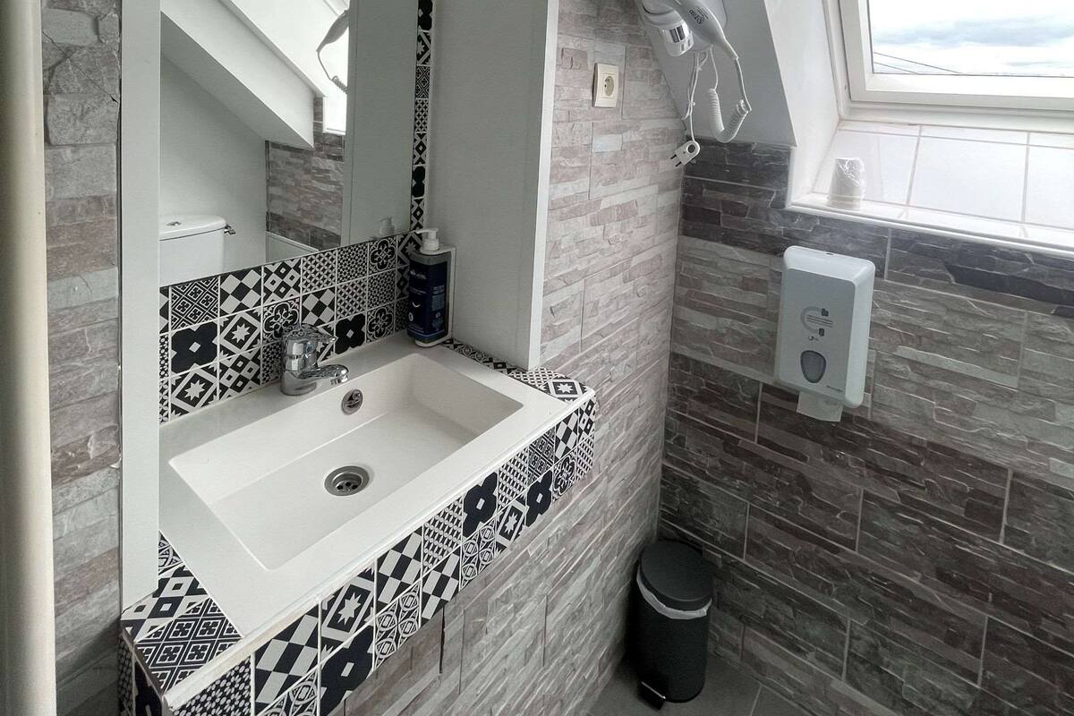 1 bedroom, desk, iron/ironing board, bed sheets