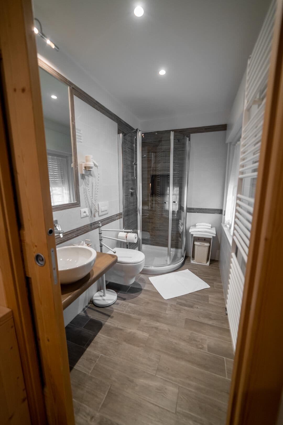 room | bathroom | shower, rainfall showerhead, designer toiletries, hair dryer