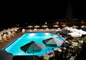 Outdoor pool, open 8:00 AM to 10:00 PM, pool umbrellas