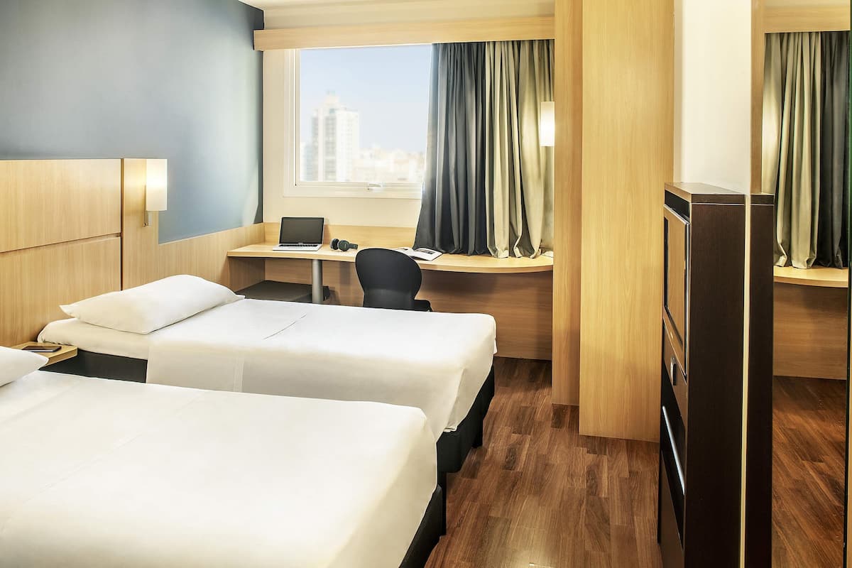 Standard Twin Room, 2 Single Beds | Minibar, in-room safe, desk, blackout curtains