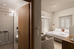 Deluxe Triple Room | Bathroom | Shower, free toiletries, slippers, towels - Apollo Apartments (Agios Vasileios)