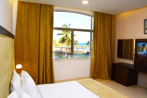 In-room safe, laptop workspace, blackout curtains, iron/ironing board