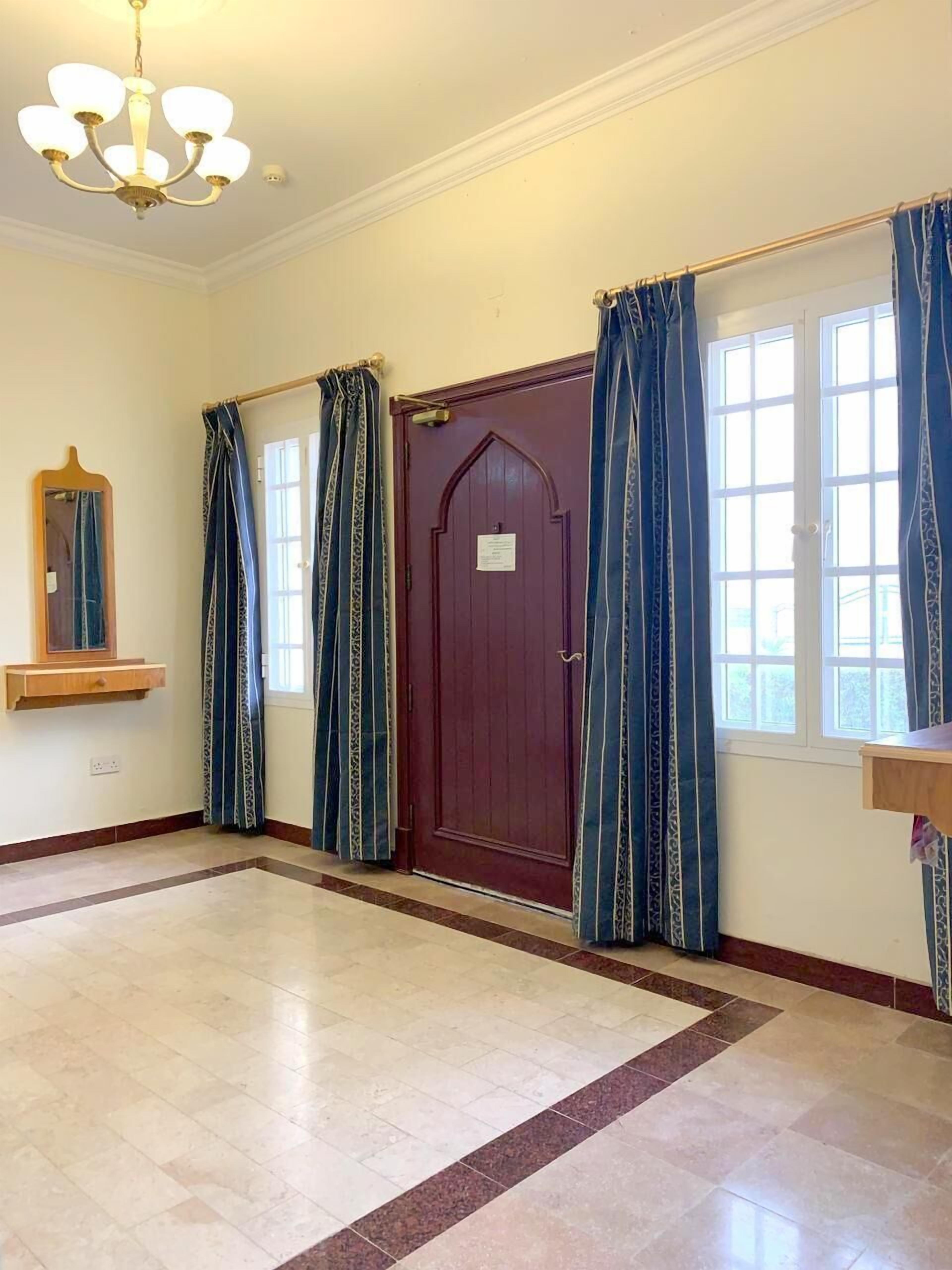 family villa | living area | flat-screen tv