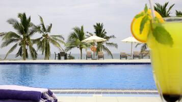 Outdoor pool, pool umbrellas, sun loungers