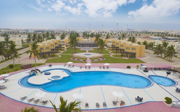 Outdoor pool, pool umbrellas, pool loungers