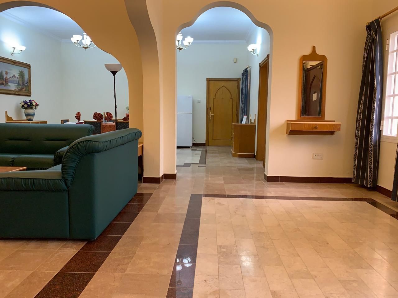 family villa | living area | flat-screen tv