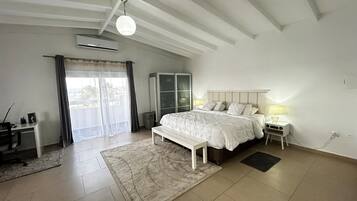 Deluxe Suite, Sea View | Premium bedding, in-room safe, soundproofing, iron/ironing board