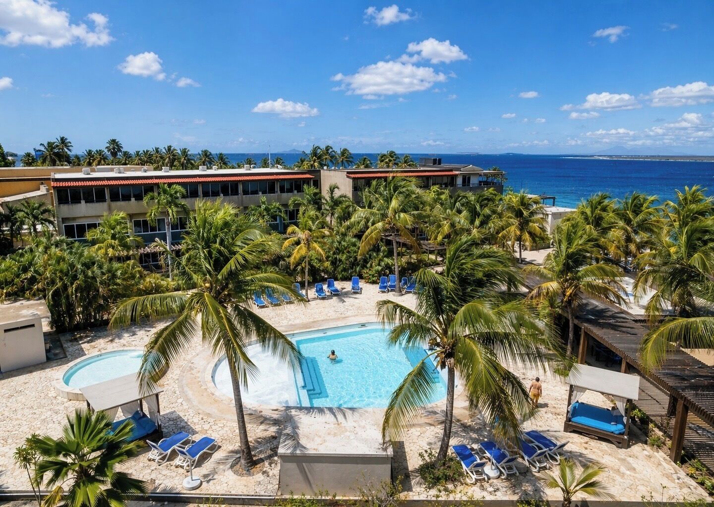 Outdoor pool, free pool cabanas, pool umbrellas