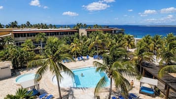 Outdoor pool, free pool cabanas, pool umbrellas