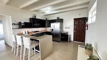 Deluxe Suite, Sea View | Premium bedding, in-room safe, soundproofing, iron/ironing board