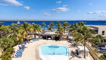 Outdoor pool, free pool cabanas, pool umbrellas