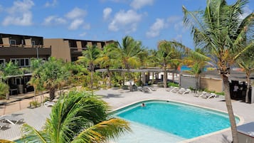 Outdoor pool, free pool cabanas, pool umbrellas