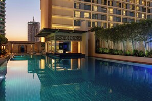 Outdoor pool, open 7:00 AM to 9:00 PM, free pool cabanas, pool umbrellas