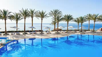 Indoor pool, 2 outdoor pools, pool umbrellas, lifeguards on site