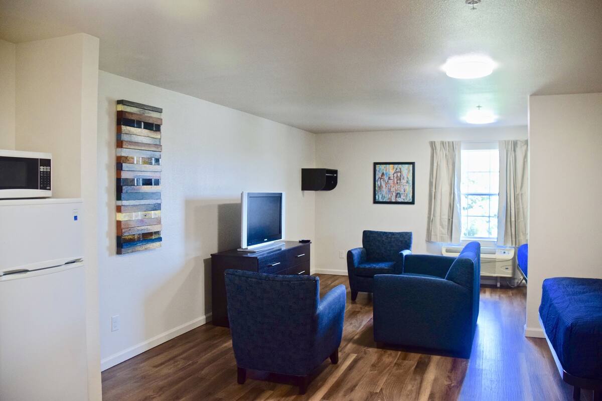 Suite, 2 Queen Beds, Non Smoking | Desk, iron/ironing board (on request), WiFi (free), bed sheets