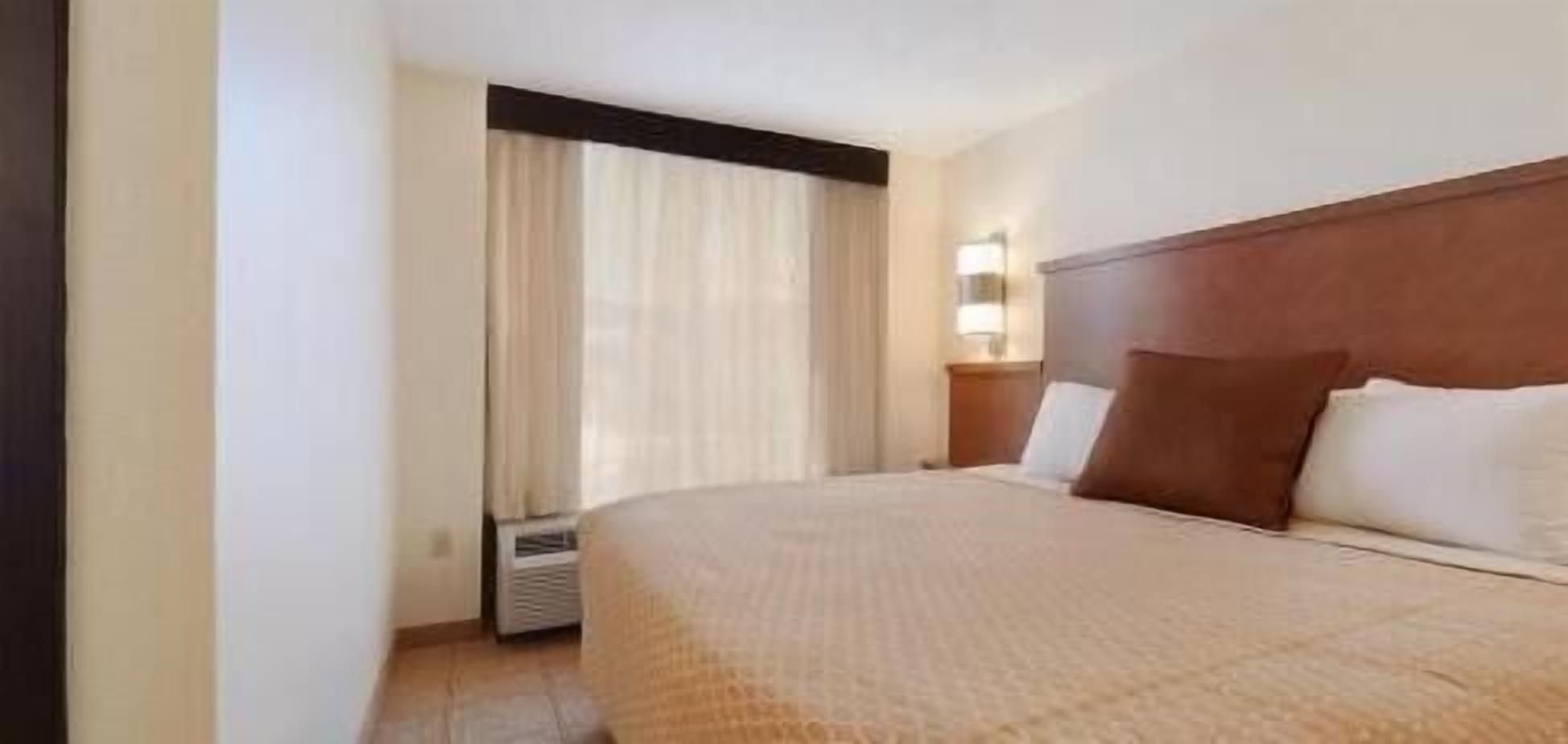 In-room safe, desk, iron/ironing board, free cribs/infant beds