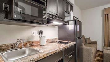 Fridge, microwave, stovetop, coffee/tea maker