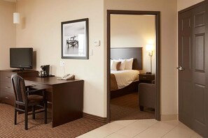 Suite, 1 Queen Bed, Non Smoking | Desk, blackout curtains, iron/ironing board, free WiFi - Travelodge Suites by Wyndham Estevan (Estevan)