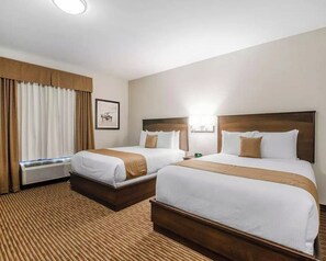 Deluxe Room, 2 Queen Beds, Non Smoking | Desk, blackout drapes, iron/ironing board, free WiFi - Travelodge Suites by Wyndham Estevan (Estevan)