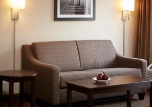 Suite, 1 Queen Bed, Non Smoking | Living area | 32-inch flat-screen TV with cable channels, TV - Travelodge Suites by Wyndham Estevan (Estevan)