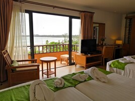 Family Quadruple Room, Sea View | Minibar, in-room safe, desk, free WiFi