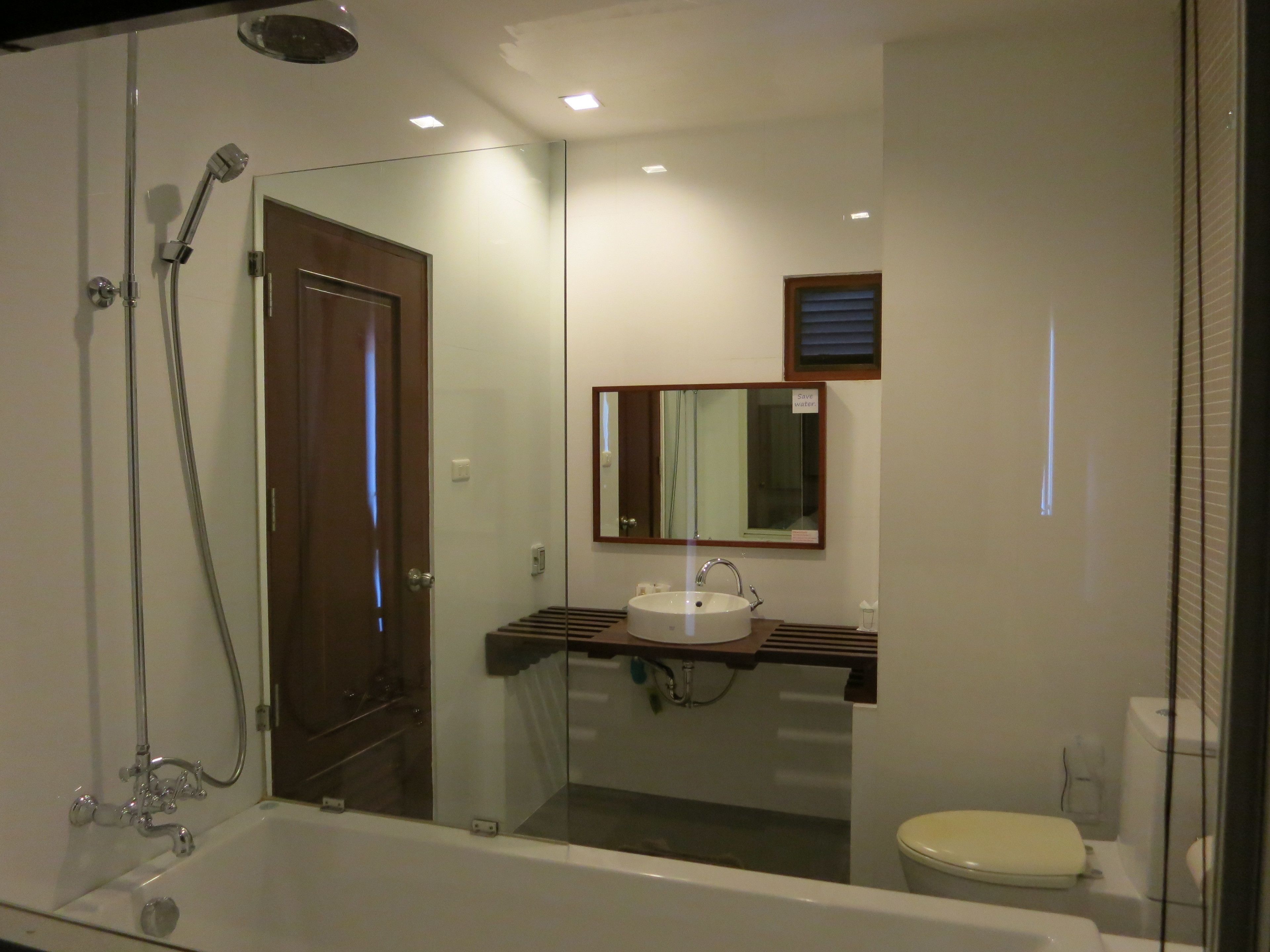 deluxe ocean terrace | bathroom | separate bathtub and shower, rainfall showerhead, free toiletries