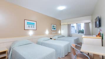 Standard Quadruple Room | Minibar, in-room safe, desk, blackout curtains