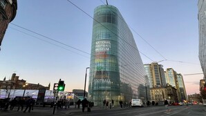 A modern glass building with signage for the National Football Museum and Drama Theatre. - Holiday Inn Express Manchester City Centre Arena by IHG (Manchester)