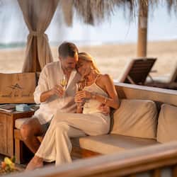 On the beach, sun-loungers, beach umbrellas, beach towels